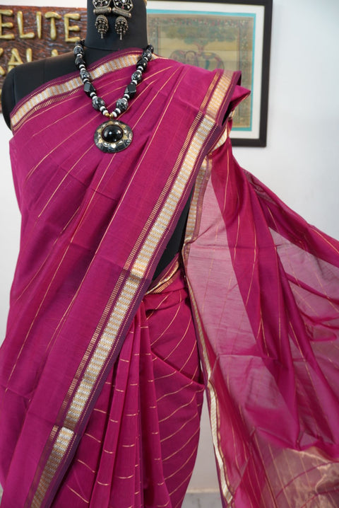 Pink striped saree with border, zari detail and fringe finish