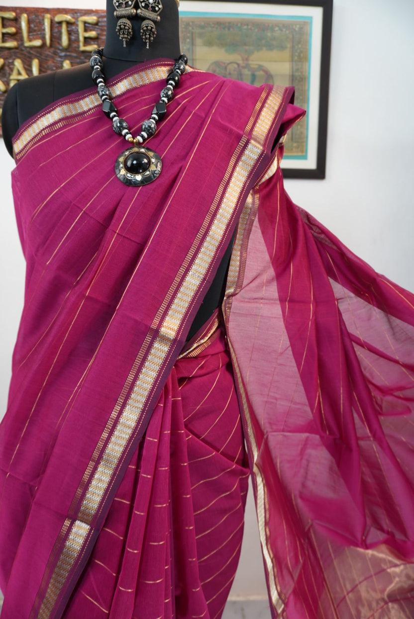Pink striped saree with border, zari detail and fringe finish