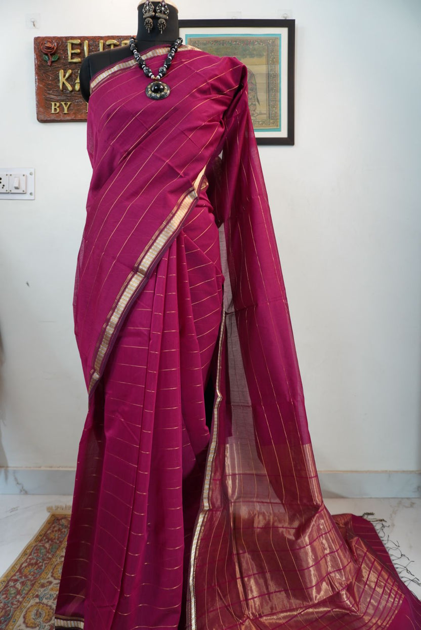 Pink striped saree with border, zari detail and fringe finish