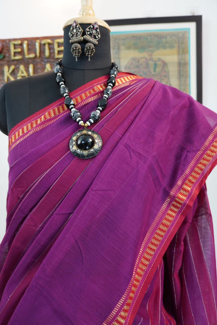 Purple striped saree with multicolor accents, border and zari details
