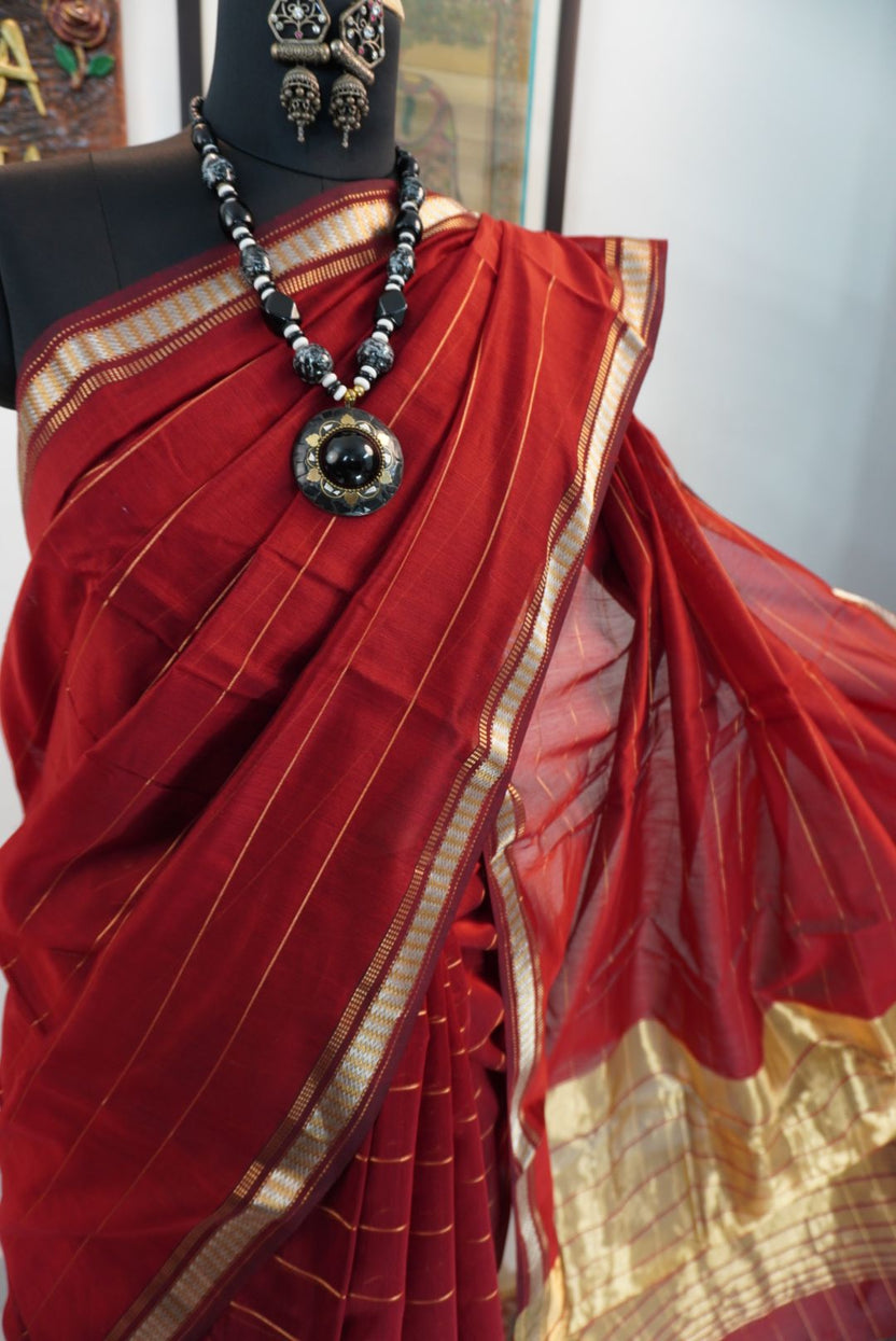 Red Maheshwari saree with striped multicolor design, border and zari detailing