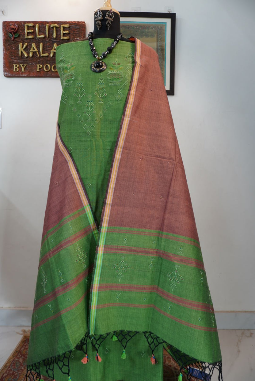 Tangaliya cotton 3 piece suit material in light green with flower detail, border and tassels