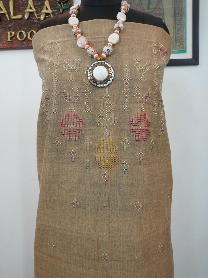 Ash beige Tangaliya cotton kurti fabric with bird motif and multicolor accents