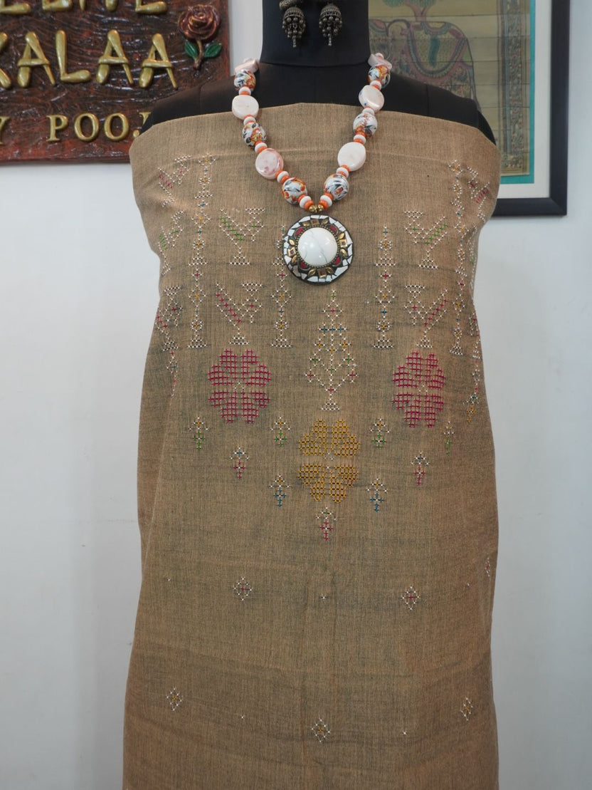 Ash beige Tangaliya cotton kurti fabric with bird motif and multicolor accents