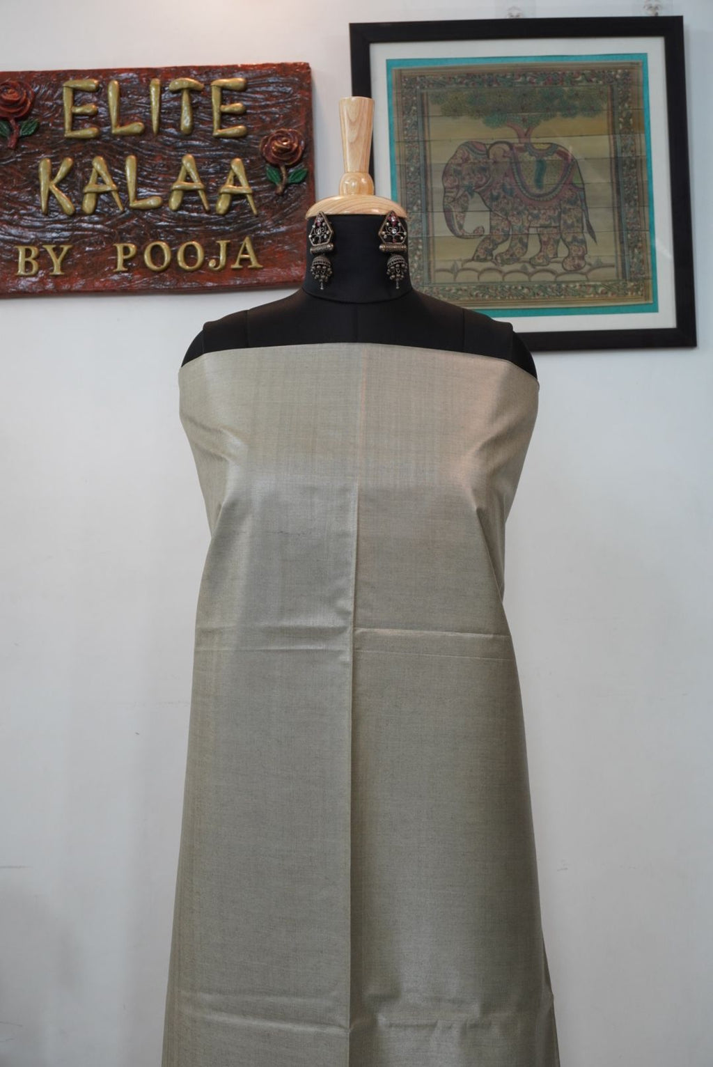 Light grey Tusser handloom fabric piece with a solid plain design